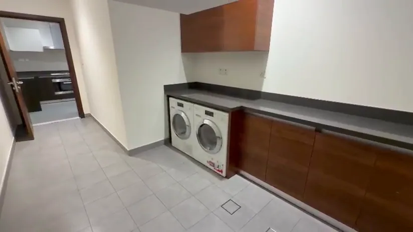 The utility room, a frame from Krisztiana’s phone video